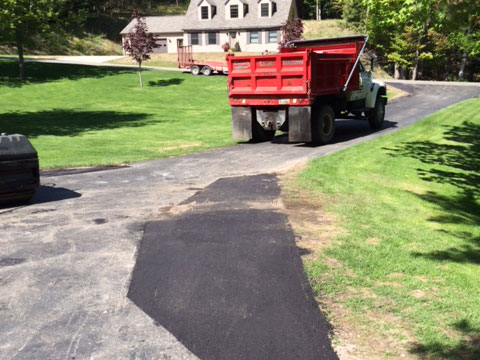 sealcoating asphalt driveway repair cadillac michigan wexford county