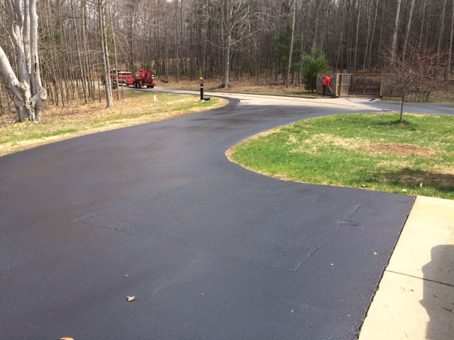 asphalt sealcoating end of driveway residential sealcoating ludington pentwater hart michigan mason county 